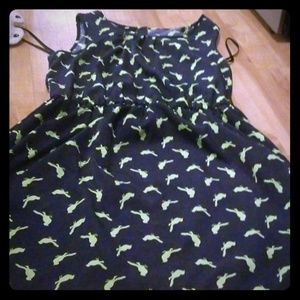 Black dress with green birds